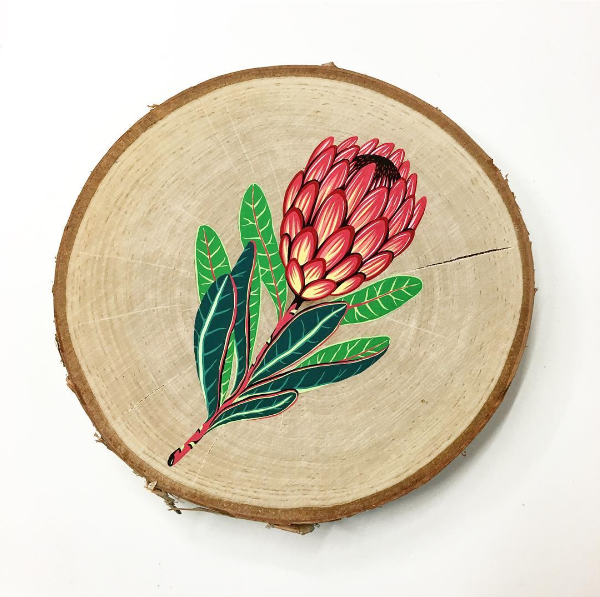 Painting done on wood of a flower